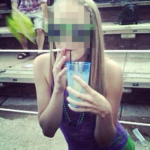 One of the photos posted by the Twitter account @Crunk_Bear, showing a young woman smoking what appears to be a joint. (Photo: Twitter/@Crunk_Bear)