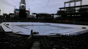 A storm blanketed Coors Field on Thursday, April 3, 2014, one day before the Rockies play their home opener. (Credit: Jon Bowman, FOX31 Denver)
