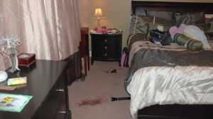 Crime scene photograph of Ashley Fallis' bedroom. 