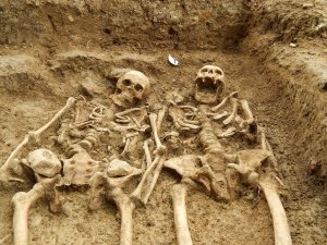 A couple of skeletons which have been "holding hands" for 700 years have been uncovered at the lost chapel of St Morrell in Leicestershire, central England. Courtesy: CNN