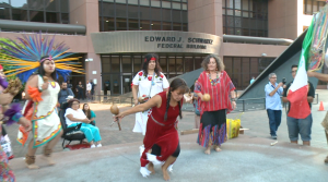 Supporters of the migrant children traveling to San Diego from Texas held a ritual outside a federal building.