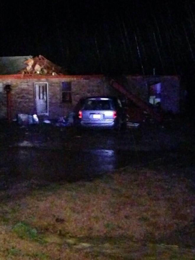 A home in Hughes, Ark., damaged by the storm