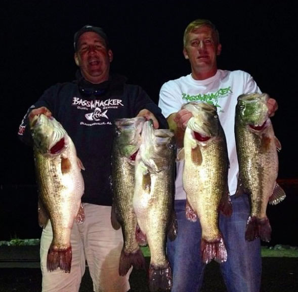 Photo of the two men holding a big catch (Wired2Fish.com, from one of the men's Facebook pages)