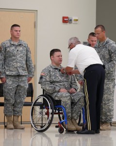 Sgt. E.H. Pittman receives the Soldier's medal