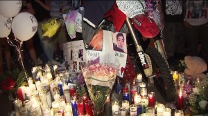 A vigil was held Wednesday for two teenagers killed in a collision with a dump truck in the Cajon Pass. (Credit: KTLA)