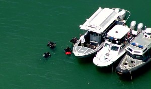Divers searched for possible victims after a boat overturned at Pyramid Lake on Sunday, June 29, 2014. (Credit: KTLA)