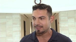 Gabriel Suarez spoke outside court on June 23, 2014, about the woman who allegedly tried to have him killed. (Credit: KTLA)