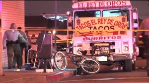 A shooting near a taco truck in East Los Angeles on June 29, 2014 left one person dead and another person injured. (Credit: KTLA)