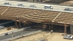 Aerial video showed the damage to the wooden overpass, which was under construction. (Credit: KTLA)