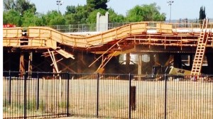 A bridge in a construction zone partially collapsed after being hit by a big rig on July 15, 2014. (Credit: Cal Fire Riverside) 