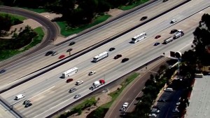 Three buses holding 140 undocumented immigrants headed to an unknown location on July 30, 2014. (Credit: KSWB)