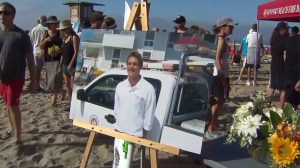 Thousands went to Newport Beach on July 13, 2014 to pay tribute to Ben Carlson, who drowned rescuing a swimmer one week earlier. (Credit: KTLA)