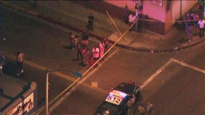 Highway Patrol officers investigate scene of a hit-and-run that killed a child on Thursday, July 10, 2014. (Credit: KTLA)