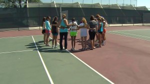 Friends prayed for Morgan Wilson at Esperanza High's tennis courts on July 10, 2014. (Credit: KTLA)