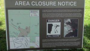 A sign warns hikers about the closure of the upper falls in Eaton Canyon beginning Aug. 1, 2014. (Credit: KTLA)