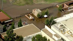 People could be seen wading through water from a massive main break on the UCLA campus July 29, 2014. (Credit: KTLA)