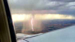 Twitter user Gina Hyams posted this photo of a lightning strike taken from a plane in the Denver area on July 24, 2014.