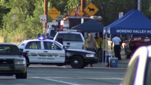 The Riverside County Sheriff's Department responded in force during a search for one or two people in Moreno Valley on July 22, 2014. (Credit: KTLA)