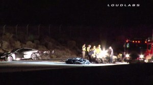 Authorities investigated a crash in Palmdale on July 4, 2014, that left four people dead and two hospitalized. (Credit: Loudlabs)