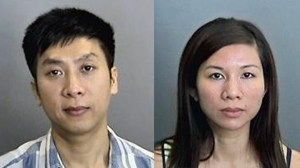 Loi Vu, 40, (left) and Tracy Trang Le, 35, were booked on suspicion of felony child endangerment and false imprisonment. (Credit: Anaheim Police Department)