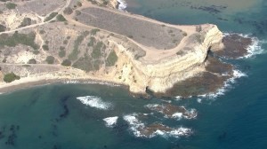 Treacherous conditions at Sacred Cove and Abalone Cove, at left, prompted multiple rescue efforts in early July 2014. (Credit: KTLA)