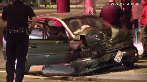 A two-vehicle crash in San Bernardino on Friday evening left a 13-year-old girl dead and two others injured, authorities said. (Credit: Loudlabs)