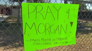 A sign in support of Morgan Wilson was posted at Esperanza High's tennis courts on July 10, 2014. (Credit: KTLA)