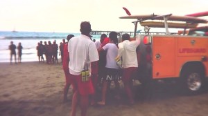 Video posted to Instagram showed lifeguards loading a person into a lifeguard vehicle after a lightning strike on July 27, 2014. 