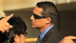 Former Los Angeles County Sheriff's Deputy Gilbert Michel, who smuggled an FBI cellphone to a inmate, walked into courthouse. (Credit: Los Angeles Times)