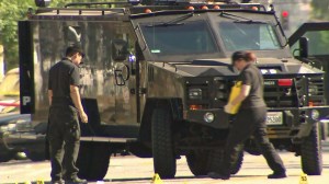 A SWAT armored truck helped save officers in a shootout on Aug. 18, 2014. (Credit: KTLA)