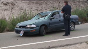 A Geo Prizm that struck a group of cyclists, injuring eight, was left with damage on San Diego's Fiesta Island Aug. 12, 2014. (Credit: KSWB)