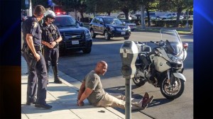 Charles Belk, who was handcuffed after mistakenly being taken for a bank robber, is seen in this photo posted to Facebook.  