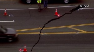 A large crack was visible in a Napa Valley County road following a large quake on Aug. 24, 2014. (Credit: KTVU)