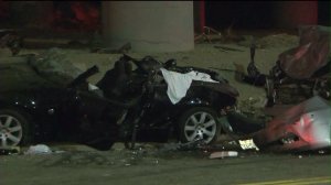 Street racing was suspected in a car crash that left two people dead and three others injured, according to LAPD. (Credit: KTLA) 