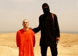 This still is from a video posted Aug. 19, 2014, purporting to show journalist James Foley being beheaded by the terrorist group Islamic State.