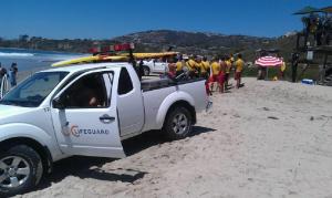 Lifeguards are seen at Salt Creek Beach, where a swimmer went missing on Saturday, Aug. 23, 2014. (Credit: Orange County Sheriff's Department)