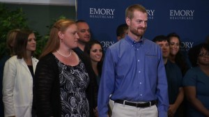 Dr. Kent Brantly, one of two American's with Ebola virus disease treated at Emory University Hospital stood next to his wife during a press conference on Thursday, Aug. 21, 2014. (Credit: CNN Pool)