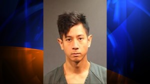 Jonathan Phan, 29, was arrested in connection with a residential burglary in Santa Ana, police said. (Credit: Santa Ana Police Department) 