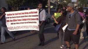 Protesters demanding justice in the deaths of Ezell Ford and Omar Abrego held a march in South L.A. on Aug. 19, 2014. (Credit: KTLA) 