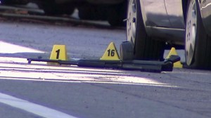 A rifle was left at the scene of a shootout that injured an LAPD SWAT officer and left the gunman dead on Aug. 18, 2014. (Credit: KTLA)