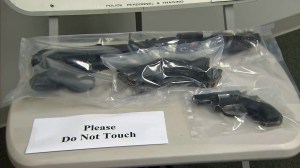 Firearms used in a shootout that left a San Bernardino police officer in critical condition were displayed at a news conference on Aug. 26, 2014. (Credit: KTLA)