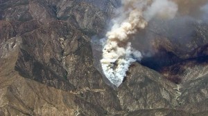Smoke rises from the Shoemaker Fire on Aug. 14, 2014. (Credit: KTLA)