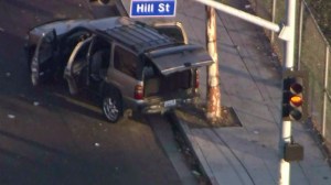 The SUV was abandoned by the two suspects at 37th and Hill streets. (Credit: KTLA)