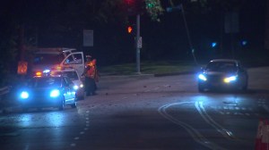 The first car heads through newly reopened Sunset Boulevard early Aug. 4, 2014. (Credit: KTLA)