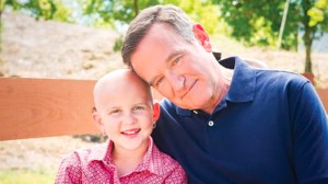 Robin Williams with St. Jude patient Darcy in 2013. (Credit: St. Jude)