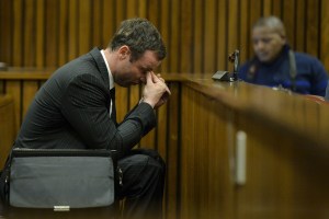 Oscar Pistorius sits in the dock during closing arguments in his murder trial in the Pretoria High Court on Aug. 8, 2014, in Pretoria, South Africa. (Credit: Herman Verwey - Pool/Foto24/Gallo Images/Getty Images)