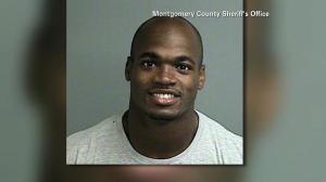 NFL player Adrian Peterson is seen in a booking photo after turning himself in on Friday, Sept. 12, 2014. (Credit: Montgomery County Sheriff's Office)