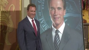 Former California Gov. Arnold Schwarzenegger's official portrait has been unveiled at the Capitol -- minus his ex-wife's face. 