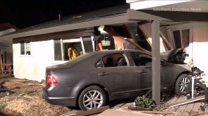 A home sustained major damage after a car crashed into it on Sept. 9, 2014. (Credit: KTLA) 