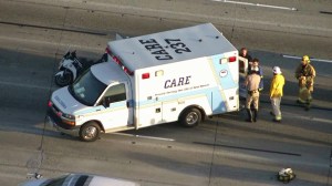 A CHP officer was injured in a crash on the 405 Freeway in Seal Beach Tuesday morning. (Credit: KTLA)